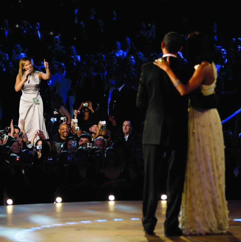 FILE -This Jan. 20, 2009 file photo shows Beyonce,left, singing as President Barack Obama and first lady Michelle Obama finish their dance at the Neighborhood Inaugural Ball in Washington. President Barack Obama's re-election campaign is getting a boost from pop stars Beyonce and Jay-Z. The superstar couple will hold a fundraiser with Obama on Tuesday at a swanky New York nightclub that Jay-Z owns. (AP Photo/Elise Amendola, File)