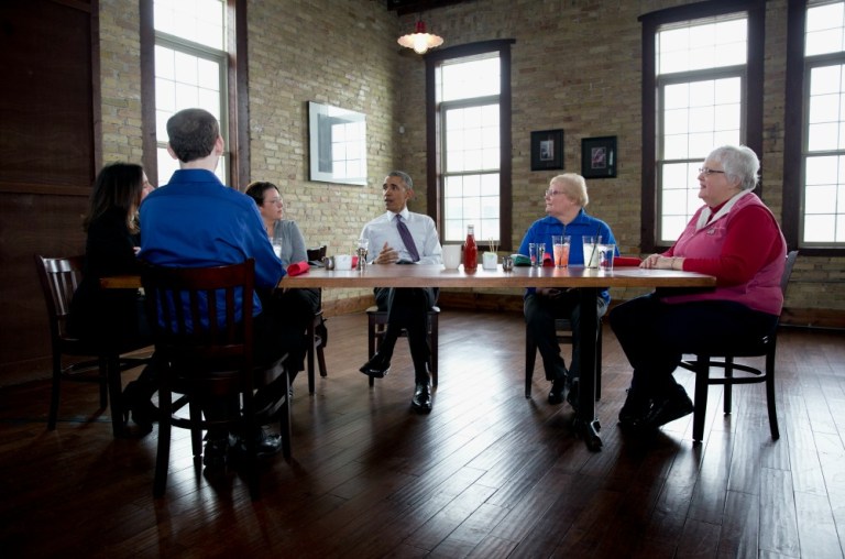 President Obama has lunch with Affordable Care Act letter writers at Engine Company No 3 in Milwaukee on March 3. (AP Photo/Carolyn Kaster)