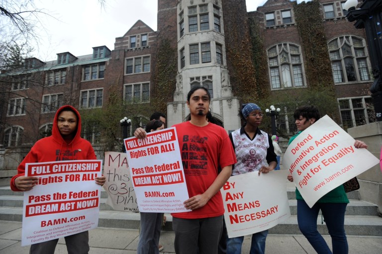 Jose Alvarenga, center, BAMN national organizer, and others protest the Supreme Court ruling on the campus of the University of Michigan Tuesday, April 22, 2014, in Ann Arbor, Mich. (AP/Detroit News, David Coates)