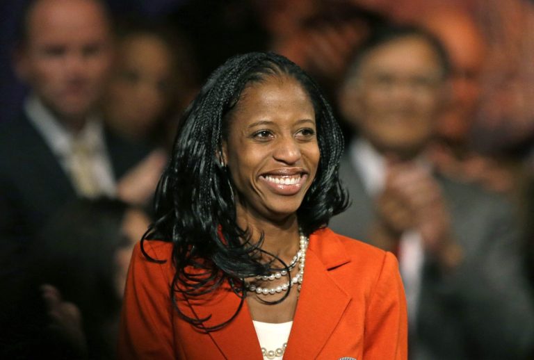 In this Oct. 8, 2014, photo, Mia Love, the Republican nominee in Utah's 4th congressional district, smiles after speaking during a rally, in Lehi, Utah. (AP Photo/Rick Bowmer)