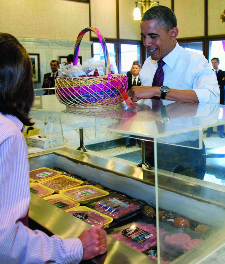 President Barack Obama picks out sausages at Usinger's Sausage, Saturday, Sept. 22, 2012, in Milwaukee. (AP Photo/Carolyn Kaster)