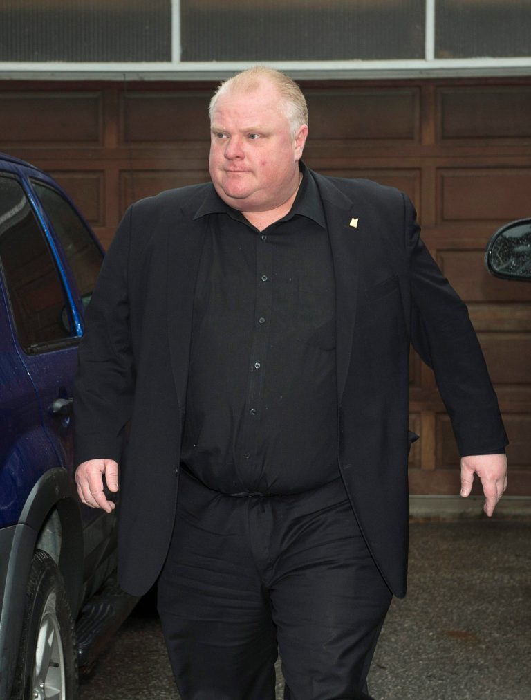 FILE - In this Thursday, May 1, 2014, file photo, Toronto Mayor Rob Ford leaves his home in Toronto. The mystery of Ford's whereabouts has deepened, following reports that he did not enter the United States via Chicago last week for rehab, as expected. (AP Photo/The Canadian Press, Frank Gunn, File)