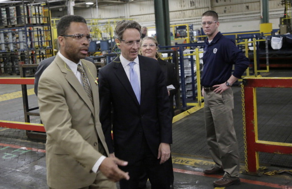 CHICAGO HEIGHTS - APRIL 4:  U.S. Treasury Secretary Timothy Geithner (2nd L) speaks with U.S. Rep. Jesse Jackson Jr. (D-IL) (L) while touring Ford Motor Company's Chicago Stamping Plant as plant manager Gloria Georger (2nd R) and UAW Local 588 President Matt Kolanowski look on April 4, 2012 in Chicago Heights, Illinois. In a speech at the Economic Club of Chicago, Geithner reportedly criticized Republicans for not supporting economic growth and for too much focus on cutting taxes and spending.  (Photo by John Gress/Getty Images)