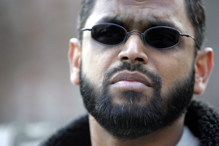FILE - This is a  Friday, March 3, 2006. file photo of Moazzam Begg  outside the United States Embassy in London. British police say a former Guantanamo Bay detainee is one of four people arrested on suspicion of Syria-related terrorism offenses. West Midlands Police said Tuesday Feb. 25, 2014  that Moazzam Begg was arrested in the Birmingham area of central England. Police say 45-year-old Begg is suspected of attending a terrorist training camp and facilitating terrorism overseas. (AP Photo/Alastair Grant, File)