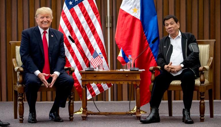 Philippines President Rodrigo Duterte, accompanied by President Trump, left, speaks during a bilateral meeting at the ASEAN Summit at the Philippine International Convention Center, Monday, Nov. 13, 2017, in Manila, Philippines. (AP Photo/Andrew Harnik)