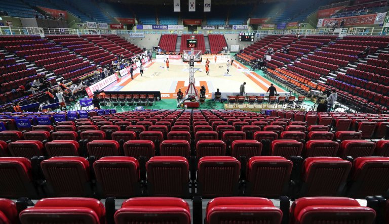 Stadium seats are empty during the Korean Basketball League between Incheon Electroland Elephants and Anyang KGC clubs in Incheon, South Korea, Wednesday, Feb. 26, 2020. The basketball game held without spectators as a precaution against the COVID-19.