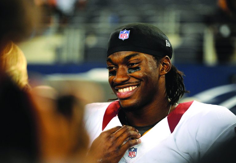 Matt Strasen/AP
Washington Redskins rookie quarterback Robert Griffin III has thrown for 2,504 yards, 16 touchdowns and four interceptions for a 104.6 passer rating this season.