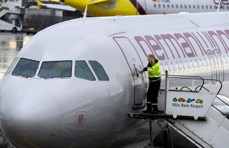 FILE - In this Feb. 22, 2010 filepicture a worker closes a Germanwings passenger jet at the airport in Cologne, Germany.  A German union representing pilots says it is planning a new round of strikes in a long-running dispute over wages and early retirement benefits. The Vereinigung Cockpit union says in a statement it will order pilots of Germanwings, a subsidiary of Germany's biggest airline Lufthansa, to go on strike Friday if further negotiations on Thursday fail to achieve their goals. (AP Photo/Martin Meissner)