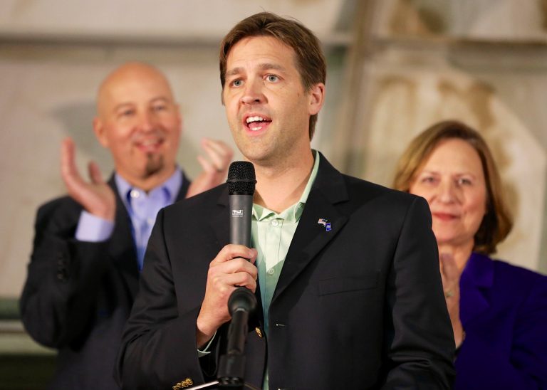 Republican Senate candidate Ben Sasse speaks at a rally in Omaha, Neb., Monday, Nov. 3, 2014, with Sen. Deb Fisher, R-Neb., right, and gubernatorial candidate Pete Ricketts, left. (AP Photo/Nati Harnik)