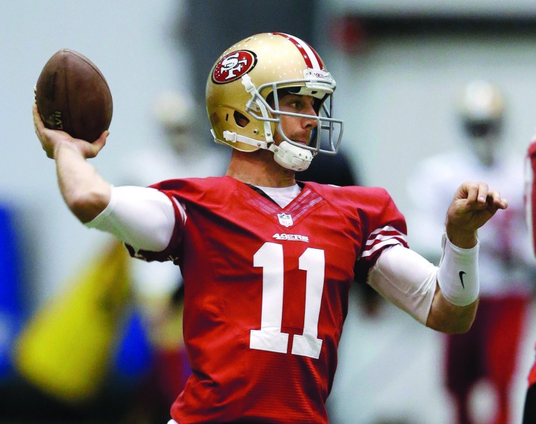 Mark Humphrey/AP
Alex Smith had a 104.1 passer rating for the 49ers but finished the season as a backup.