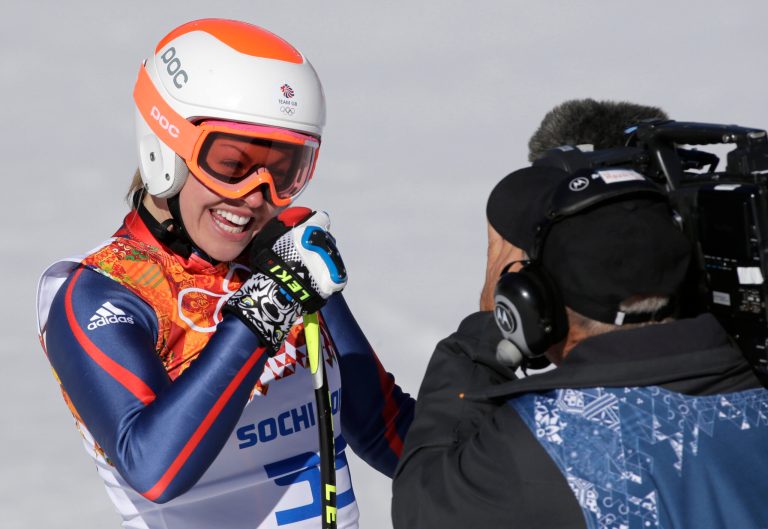 Britain's Chemmy Alcott smiles after finishing the women's downhill at the Sochi 2014 Winter Olympics, Wednesday, Feb. 12, 2014, in Krasnaya Polyana, Russia. (AP Photo/Gero Breloer)