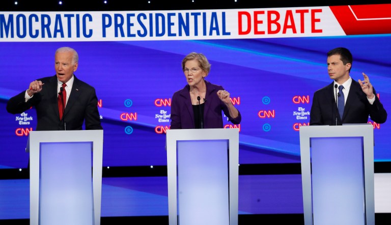 Democratic presidential candidate former Vice President Joe Biden, left, Sen. Elizabeth Warren, D-Mass., middle, and South Bend Mayor Pete Buttigieg participate in a Democratic presidential primary debate hosted by CNN/New York Times at Otterbein University, Tuesday, Oct. 15, 2019, in Westerville, Ohio.