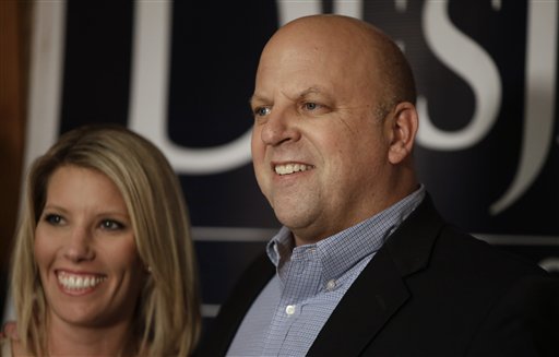 FILE - In this Nov. 6, 2012 file photo, U.S. Rep. Scott DesJarlais, R-Tenn., greets supporters on election night in Winchester, Tenn. At left is his wife, Amy. A little more than a week after the election, the voters of Tennessee's 4th District got proof that their congressmen, an anti-abortion physician, had misled them repeatedly about having affairs with patients, encouraging a lover to get an abortion and using a gun to intimidate his ex-wife during an argument. (AP Photo/Mark Humphrey)