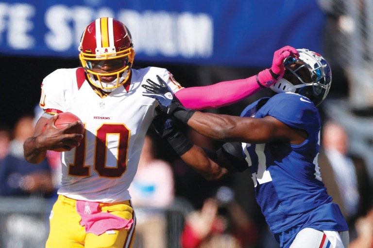 Julio Cortez/AP
Robert Griffin III ran for 89 yards in a loss against the Giants in late October.
