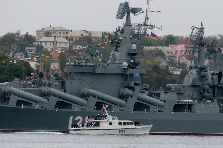 Russian President Vladimir Putin, on a boat, inspects the missile cruiser Moskva during a navy parade marking the Victory Day in Sevastopol, Crimea, Friday, May 9, 2014. Putin extolled the return of Crimea to Russia before tens of thousands Friday during his first trip to Black Sea peninsula since its annexation.  The triumphant visit was quickly condemned by Ukraine and NATO.  (AP Photo / Ivan Sekretarev)