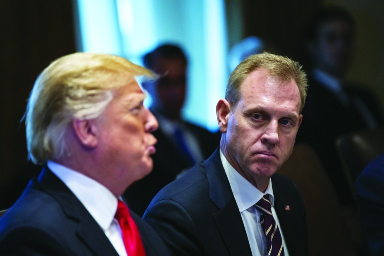 Patrick Shanahan, acting U.S. secretary of defense, right, listens while U.S. President Donald Trump speaks during a meeting in the Cabinet Room of the White House in Washington, D.C., U.S., on Wednesday, Jan. 2, 2018. TrumpÂ insisted the U.S. needs some kind of physical barrier along the frontier with Mexico, just a few hours before a meeting with congressional leaders aimed at breaking a stalemate over border wall funding thatâs kept parts of the federal government shut down for 12 days. Photographer: Al Drago/Bloomberg