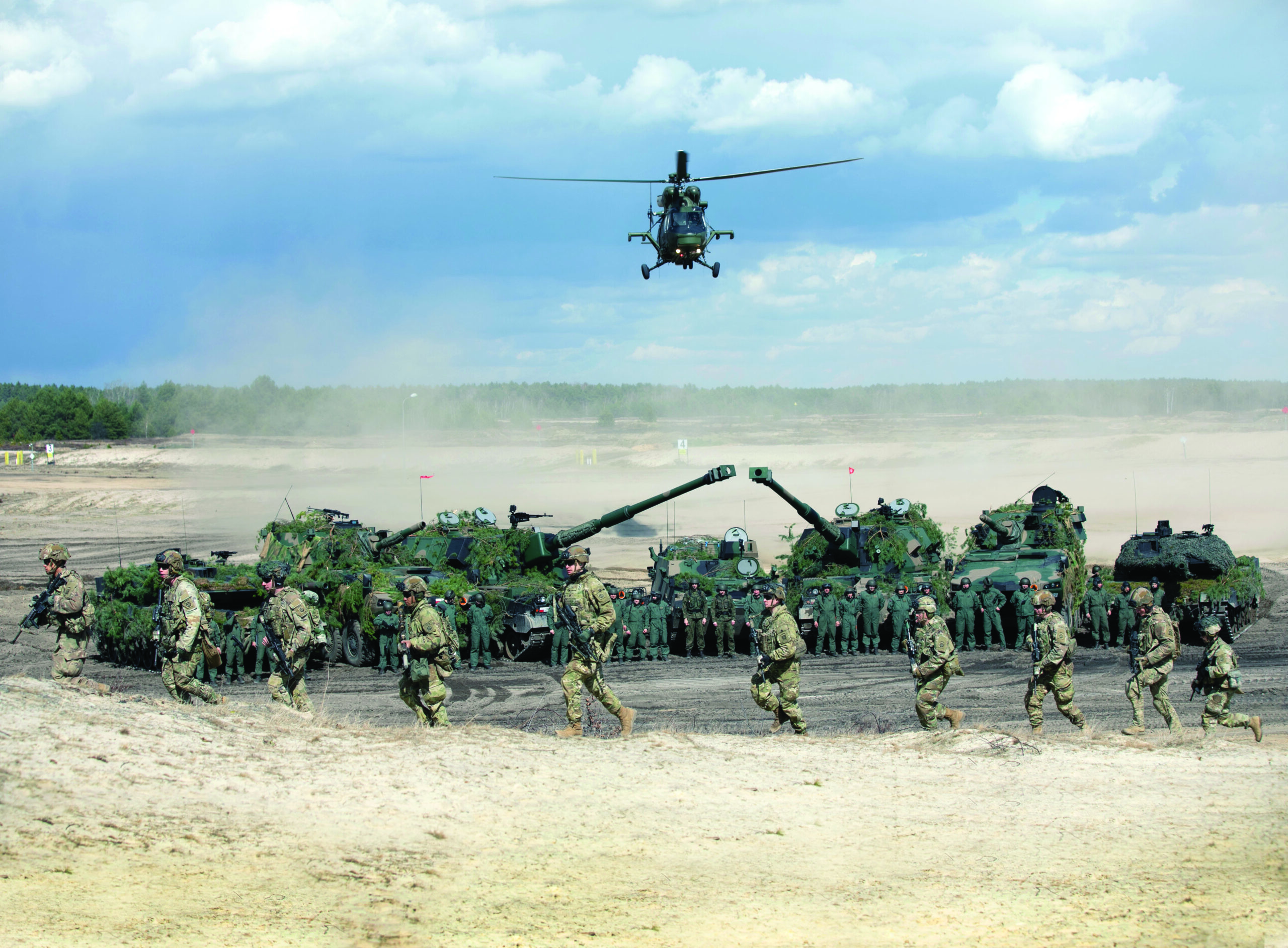 U.S. And Polish Army Troops In A Joint Tactical Training Session