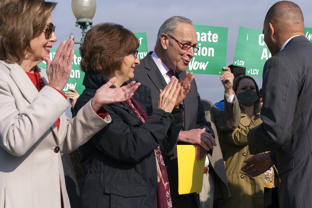 Democrats tout green energy policies ahead of spending bill vote