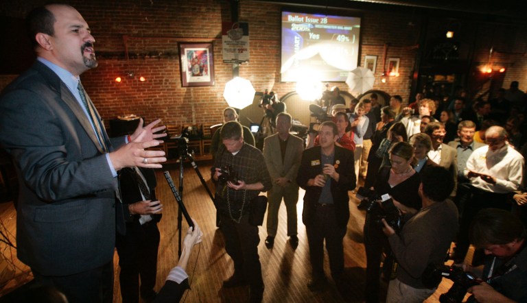 Jon Caldara, head of the opposition to referenda C and D, announces results to supporters during a election night party in Denver, Tuesday, Nov. 1, 2005.