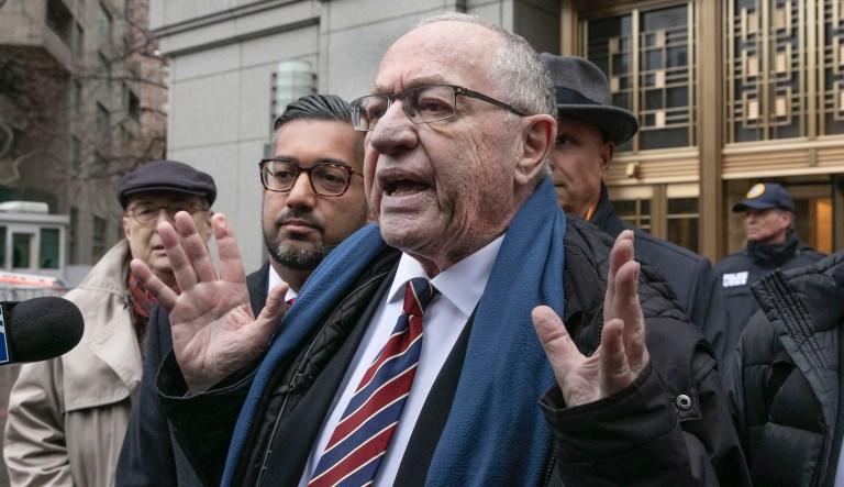 Attorney Alan Dershowitz talks to the press outside federal court, in New York, Monday, Dec. 2, 2019. Dershowitz on Monday attended a court hearing in his ongoing legal battle with Virginia Roberts Giuffre, a woman who claims to have been pressured into having sex with Dershowitz by Jeffrey Epstein when she was 17. She and Dershowitz are suing each other, each claiming the other is lying. 