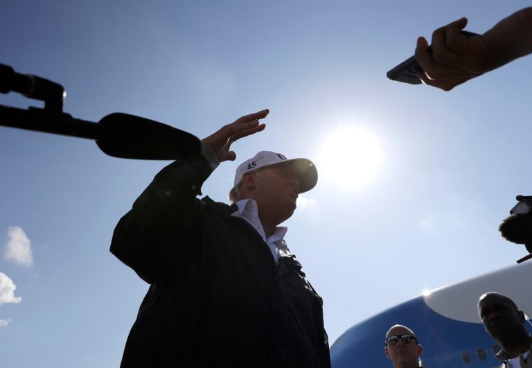 President Donald Trump talks to the media after arriving at Southwest Florida International airport to meet with first responders and people impacted by Hurricane Irma, Thursday, Sept. 14, 2017, in Ft. Myers, Fla. (AP Photo/Evan Vucci)