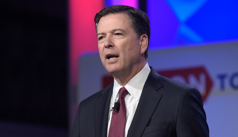 A person familiar with the investigation into Hillary Clinton's emails says Huma Abedin did not forward "hundreds and thousands" of emails to her husband's laptop, as FBI Director James Comey testified to Congress. (AP Photo/Susan Walsh)