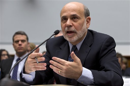 Federal Reserve chairman Ben Bernanke told House and Senate committees that the Fed won't raise interest rates anytime soon. (AP Photo/Carolyn Kaster)