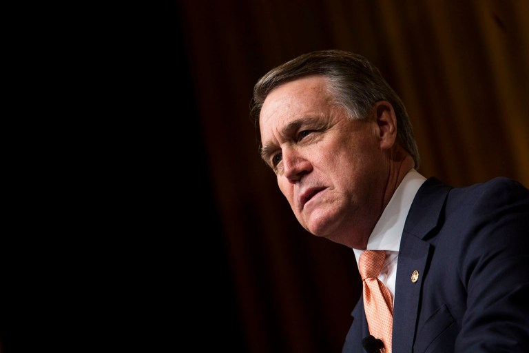 Perdue's bill, the Securing Our Secrets Act, would force agency employees who have security clearances to undergo a new round of training on how to handle classified information. (Drew Angerer/Bloomberg, File)