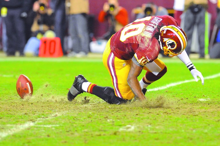 Richard Lipski/AP
Health concerns for Robert Griffin III and Stephen Strasburg helped end the 2012 seasons of the Redskins and Nationals.