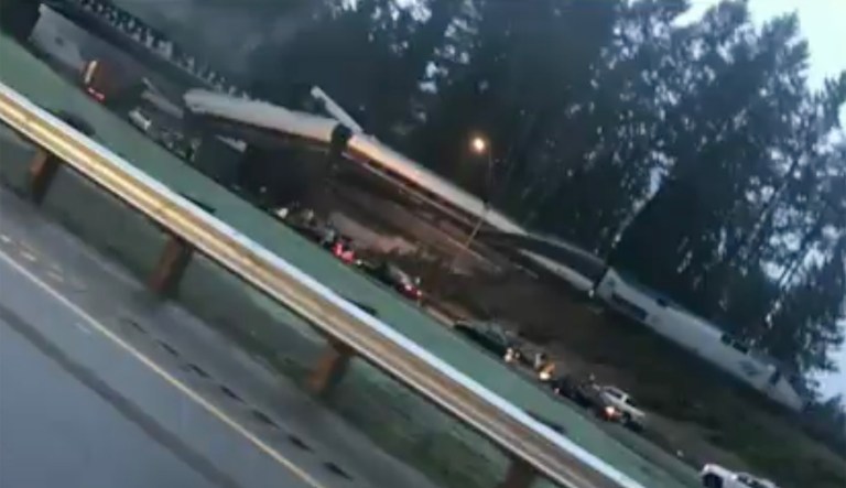 Amtrak and the Washington State Department of Transportation both confirmed Train 501 crashed onto the southbound side of I-5 in Pierce County. (Image courtesy screenshot)