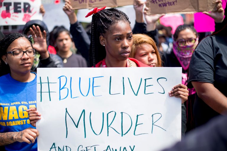 Emani Williams joins protesters against fatal shootings by police of black men on Saturday, July 9, 2016, in San Francisco. (AP Photo/Noah Berger)