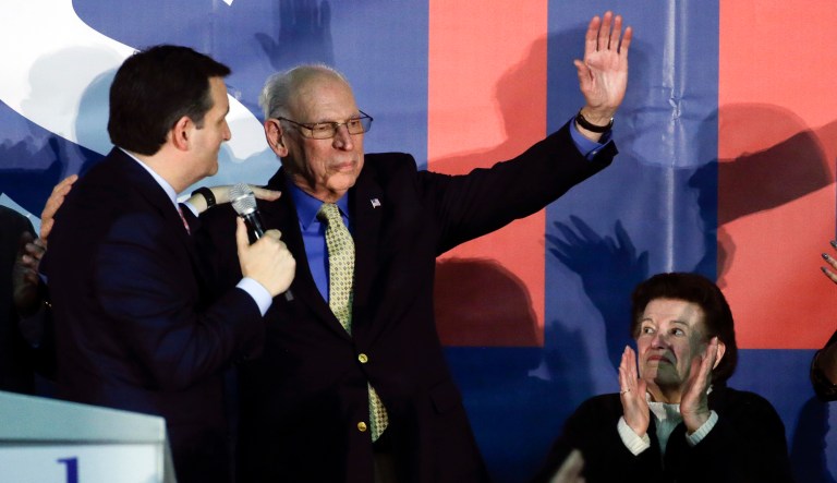 FILE - In this Feb. 1, 2016 file photo, Republican presidential candidate, Sen. Ted Cruz, R-Texas greets his father Rafael as his mother Eleanor Darragh applauds during a rally in Des Moines, Iowa. (AP Photo/Chris Carlson, File)
