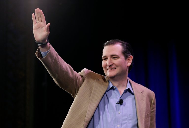 U.S. Sen. Ted Cruz, R-Texas, waves before speaking at the Freedom Summit, Saturday, Jan. 24, 2015, in Des Moines, Iowa. (AP Photo/Charlie Neibergall)