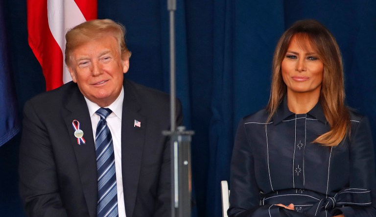 President Donald Trump, left and first lady Melania Trump listen as the names of the 44 people who died in the crash of Flight 93 are read during the September 11th Flight 93 Memorial Service at the Flight 93 National Memorial in Shanksville, Pa., Tuesday, Sept. 11, 2018.