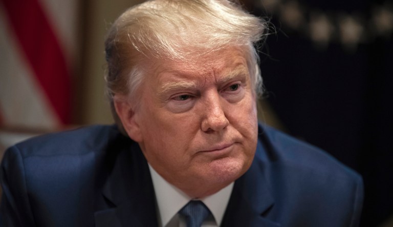 President Donald Trump listens during a roundtable with governors on government regulations in the Cabinet Room of the White House, Monday, Dec. 16, 2019, in Washington.
