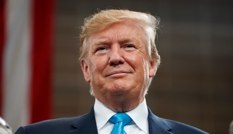 President Donald Trump arrives to speak about energy and infrastructure at the International Union of Operating Engineers International Training and Education Center, Wednesday, April 10, 2019, in Crosby, Texas.