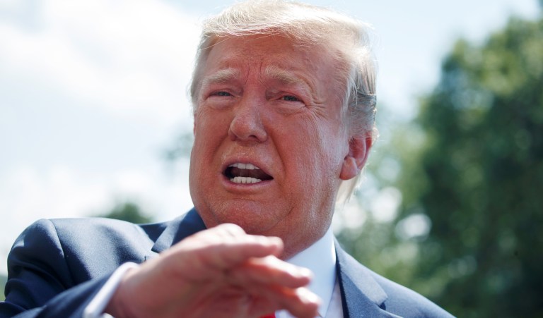 President Donald Trump talks to reporters on the South Lawn of the White House before departing for his Bedminster, N.J. golf club, Friday, July 5, 2019, in Washington. 