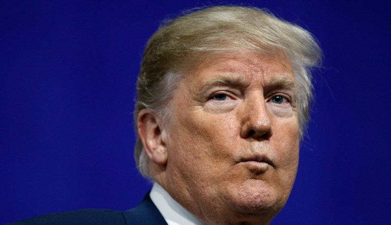 President Trump pauses as he speaks at a campaign rally at Atlantic Aviation in Moon Township, Pa., Saturday, March 10, 2018. 