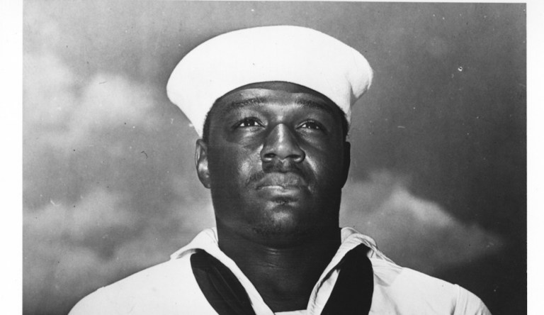 Doris Miller poses with his Navy Cross.