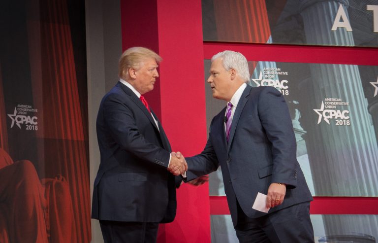 CPAC chief Matt Schlapp greets President Trump at the annual conservative convention February 2018.