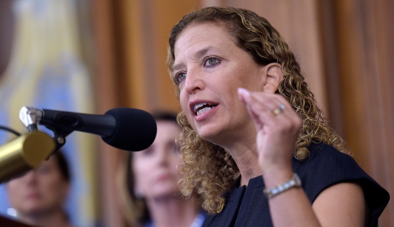 FILE - In this Sept. 7, 2016 file photo, Rep. Debbie Wasserman-Schultz, D-Fla. speaks during a news conference on Capitol Hill in Washington. An FBI investigation and congressional probes into the Trump campaign and contacts with Russia continue to shadow the administration, each new development a focus of White House press briefings and attention on Capitol Hill.