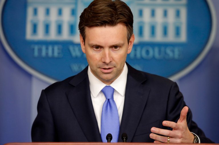 White House press secretary Josh Earnest gestures during the daily press briefing at the White House in Washington, Monday, Aug. 25, 2014, where he took questions on ISIS, Iraq, and Syria. He also received congratulations for his newborn baby. (AP Photo/Charles Dharapak)