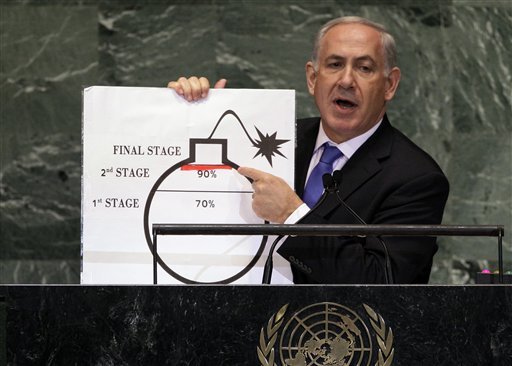 In this Thursday, Sept. 27, 2012 photo, Prime Minister Benjamin Netanyahu of Israel shows an illustration as he describes his concerns over Iran's nuclear ambitions during his address to the 67th session of the United Nations General Assembly at U.N. headquarters. Netanyahu's use of a cartoon-like drawing of a bomb to convey a message over Iran's disputed nuclear program this week, follows in a long and storied tradition of leaders and diplomats using props to make their points at the United Nations. (AP Photo/Richard Drew)