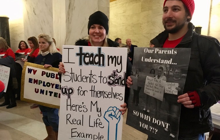 Demonstrators are expressing their frustration over pay raises and other issues. (AP Photo/John Raby)