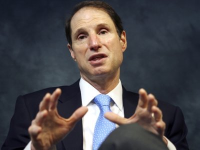  He'll give up his tax carveouts when you give up yours. (AP Photo) 