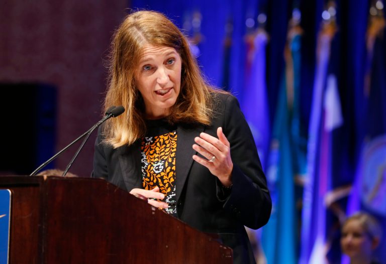 US Secretary of Health and Human Services, Sylvia Mathews Burwell gestures during the closing session at the National Governors Association Summer meeting at the Greenbrier in White Sulphur Springs, W. Va., Saturday, July 25, 2015. (AP Photo/Steve Helber)