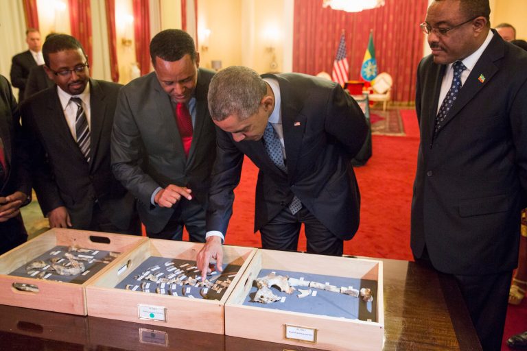 Ethiopian Prime Minister Hailemariam Desalegn watches at right as President Barack Obama touches 