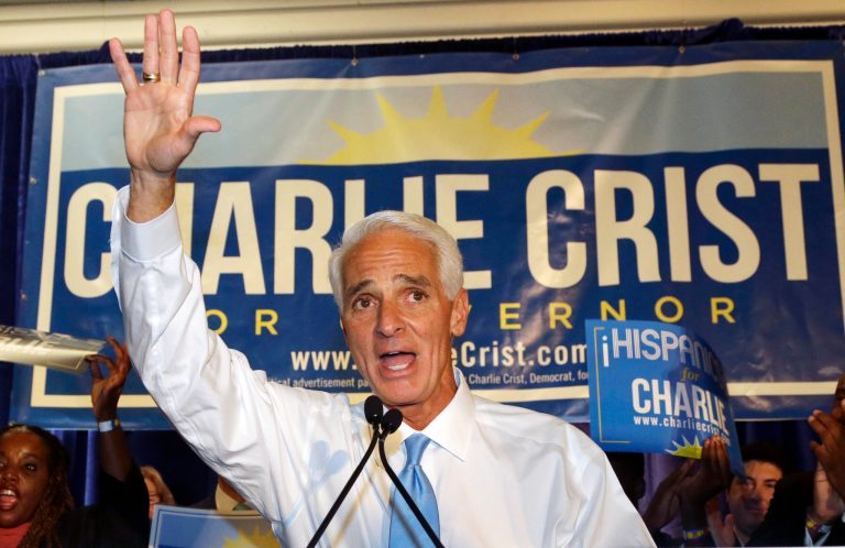 Former Republican Gov. Charlie Crist waves to supporters while speaking at a victory party after Florida's primary election Tuesday in Fort Lauderdale, Fla. (AP/Wilfredo Lee)