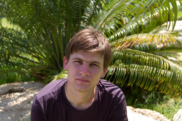   In this June 11, 2012 photo, Andre Pshenichnikov, a 23-year-old immigrant from Tajikistan who was recently detained by Israeli police for residing illegally in the Dheishe Refugee Camp near Bethlehem, poses for a picture in Bat Yam near Tel Aviv, Israel. In what has to be considered one of the oddest twists to the never-ending Israeli-Palestinian saga, Pshenichnikov has embarked on a new fight: renouncing his Israeli citizenship and moving to a Palestinian refugee camp in the West Bank. It's incredibly rare for Israelis to seek living under Palestinian rule, only a few precedents of Israelis who have done so are known. (AP Photo/Ariel Schalit)  