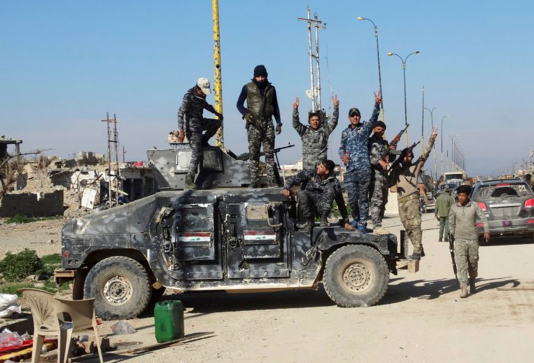 Iraqi security forces after heavy clashes with Islamic State group fighters. (AP Photo)